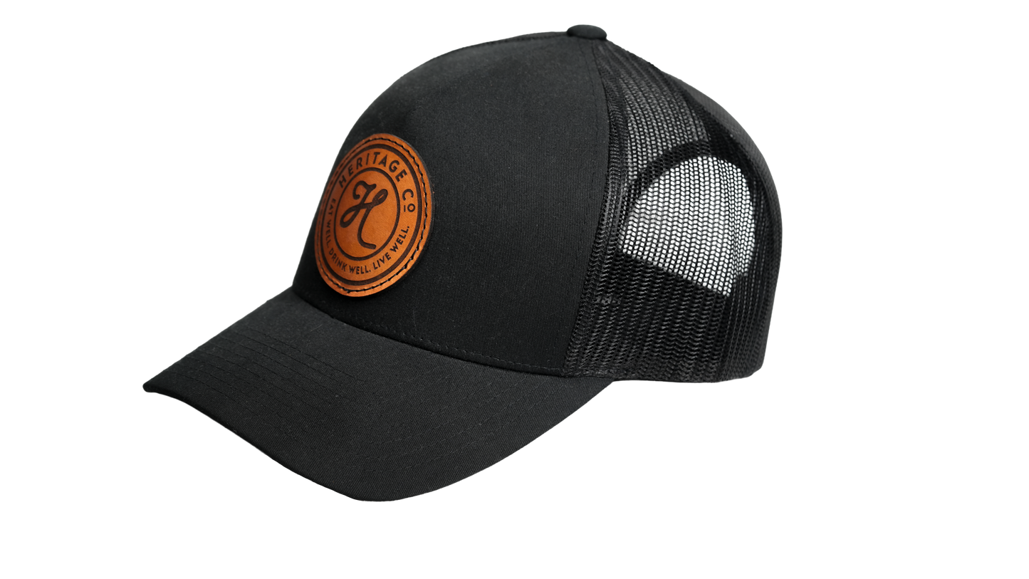 HERITAGE Circle Logo on Black Retro Trucker Hat